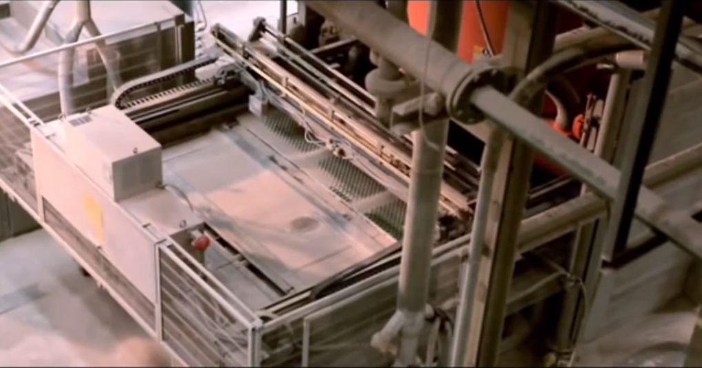 Tile pressing machine powder filling.png